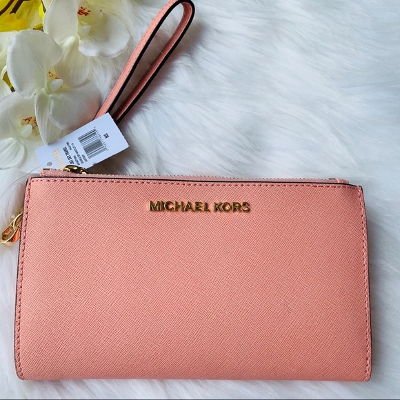 Michael Kors Handbags - MICHAEL KORS  LARGE DOUBLE ZIP WRISTLET PALE PINK